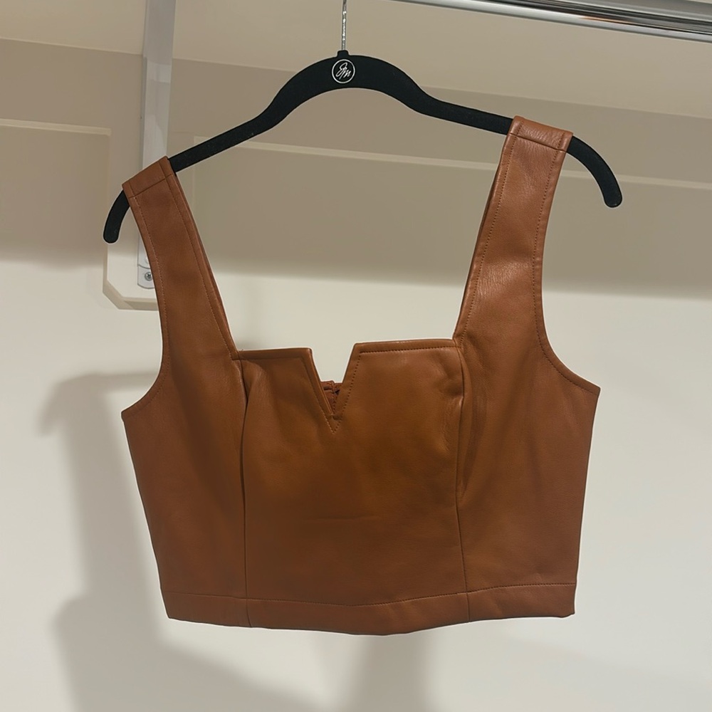 Brown Anthropology zip up faux leather top